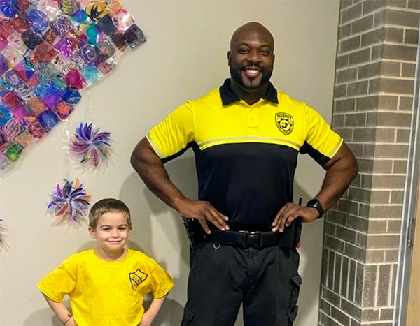 Kindergartener Dresses Up as School's Security Guard for